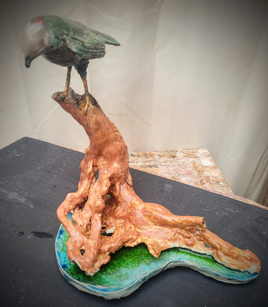 Bird on a Branch on a Pond